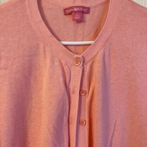 Cute peach colored short sleeve sweater.